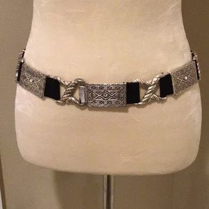 Vintage black stretch belt with silver accents.